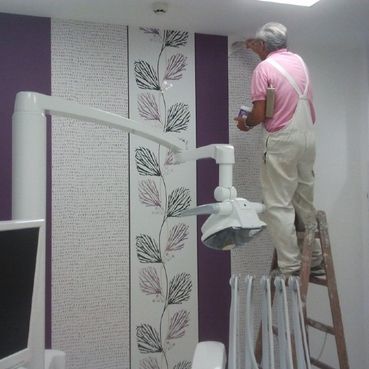 Painter painting the room 